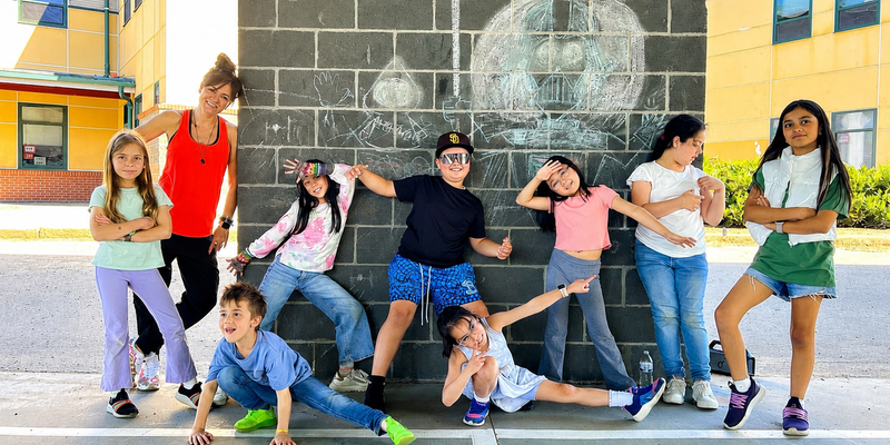 Children enjoying dance and creative activities during midwinter break camp